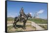 Statue of a Mongolian Empire warrior and Genghis Khan Statue Complex in the background, Erdene, Tov-Francesco Vaninetti-Framed Stretched Canvas