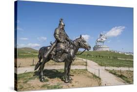 Statue of a Mongolian Empire warrior and Genghis Khan Statue Complex in the background, Erdene, Tov-Francesco Vaninetti-Stretched Canvas