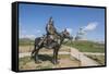 Statue of a Mongolian Empire warrior and Genghis Khan Statue Complex in the background, Erdene, Tov-Francesco Vaninetti-Framed Stretched Canvas