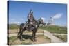 Statue of a Mongolian Empire warrior and Genghis Khan Statue Complex in the background, Erdene, Tov-Francesco Vaninetti-Stretched Canvas