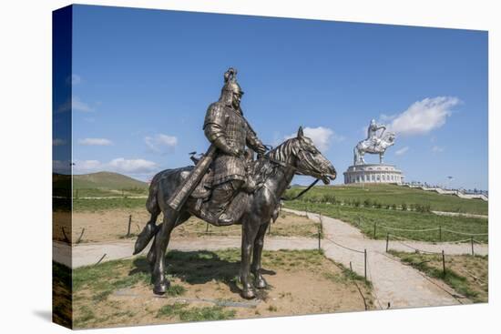 Statue of a Mongolian Empire warrior and Genghis Khan Statue Complex in the background, Erdene, Tov-Francesco Vaninetti-Stretched Canvas