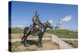 Statue of a Mongolian Empire warrior and Genghis Khan Statue Complex in the background, Erdene, Tov-Francesco Vaninetti-Stretched Canvas