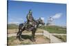 Statue of a Mongolian Empire warrior and Genghis Khan Statue Complex in the background, Erdene, Tov-Francesco Vaninetti-Stretched Canvas