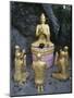 Statue of Buddha with Kneeling Faithful-null-Mounted Giclee Print