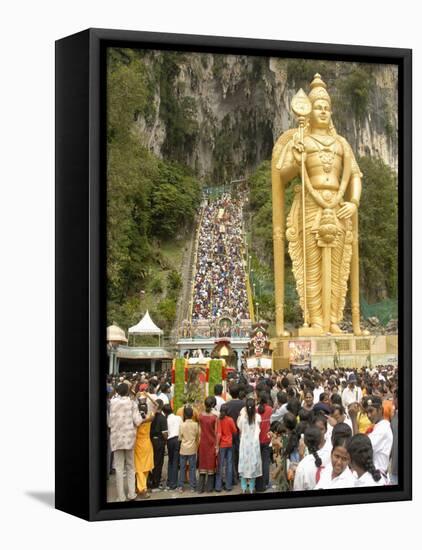 Statue of Hindu Deity with Pilgrims Walking 272 Steps up to Batu Caves, Selangor, Malaysia-Richard Nebesky-Framed Stretched Canvas