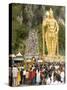 Statue of Hindu Deity with Pilgrims Walking 272 Steps up to Batu Caves, Selangor, Malaysia-Richard Nebesky-Stretched Canvas