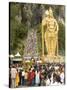 Statue of Hindu Deity with Pilgrims Walking 272 Steps up to Batu Caves, Selangor, Malaysia-Richard Nebesky-Stretched Canvas