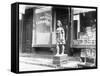 Statue of Indian in Front of Cigar Store-null-Framed Stretched Canvas