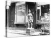 Statue of Indian in Front of Cigar Store-null-Stretched Canvas