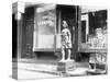 Statue of Indian in Front of Cigar Store-null-Stretched Canvas