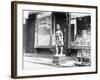 Statue of Indian in Front of Cigar Store-null-Framed Photographic Print