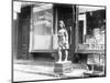 Statue of Indian in Front of Cigar Store-null-Mounted Photographic Print