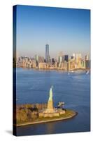 Statue of Liberty and Lower Manhattan, New York City, New York, USA-Jon Arnold-Stretched Canvas