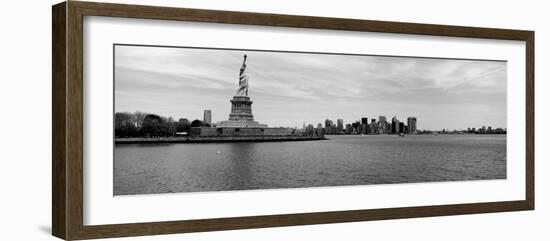 Statue of Liberty with Manhattan Skyline in the Background, Ellis Island, New Jersey-null-Framed Photographic Print