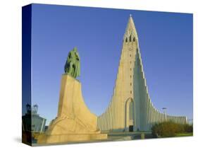 Statue of Liefur Eiriksson and the Hallgrimskikja Church, Reykjavik, Iceland, Polar Regions-Simon Harris-Stretched Canvas