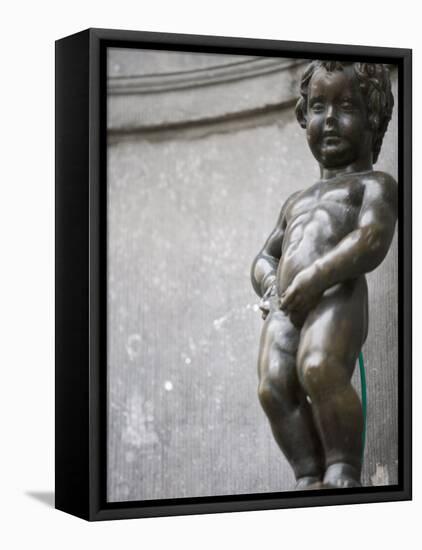 Statue of Manneken Pis Fountain, Brussels, Belgium, Europe-Martin Child-Framed Stretched Canvas