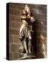 Statue of St. Joan of Arc with Coloured Light from Stained Glass, Church of Notre Dame, Vitre, Brit-Nick Servian-Stretched Canvas