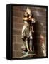 Statue of St. Joan of Arc with Coloured Light from Stained Glass, Church of Notre Dame, Vitre, Brit-Nick Servian-Framed Stretched Canvas