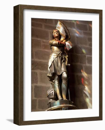 Statue of St. Joan of Arc with Coloured Light from Stained Glass, Church of Notre Dame, Vitre, Brit-Nick Servian-Framed Photographic Print