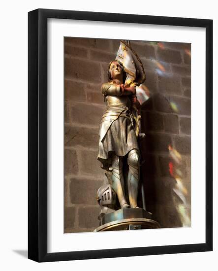 Statue of St. Joan of Arc with Coloured Light from Stained Glass, Church of Notre Dame, Vitre, Brit-Nick Servian-Framed Photographic Print