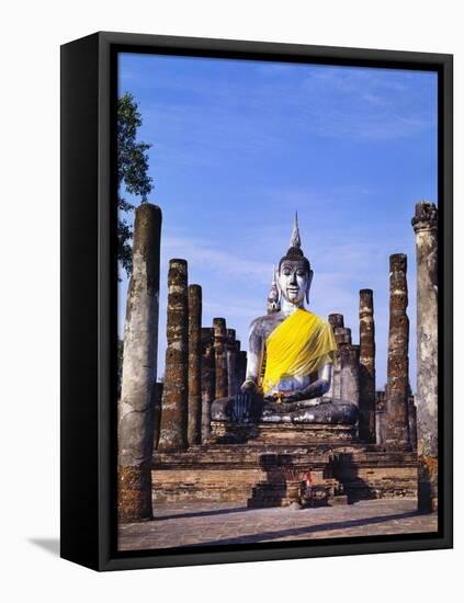 Statue of the Buddha with Religious Offerings, Wat Mahathat, Sukothai, Thailand-Adina Tovy-Framed Stretched Canvas