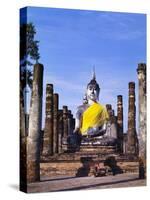 Statue of the Buddha with Religious Offerings, Wat Mahathat, Sukothai, Thailand-Adina Tovy-Stretched Canvas