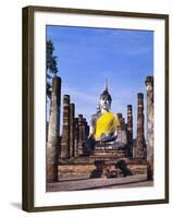 Statue of the Buddha with Religious Offerings, Wat Mahathat, Sukothai, Thailand-Adina Tovy-Framed Photographic Print