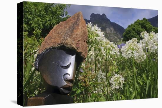 Statue with Agapanthus and Table Mountain Behind-Eleanor-Stretched Canvas