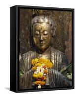 Statue with Offering of Marigold Flowers, Emerald Buddha Temple, Bangkok, Thailand, Southeast Asia-Alain Evrard-Framed Stretched Canvas
