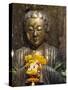 Statue with Offering of Marigold Flowers, Emerald Buddha Temple, Bangkok, Thailand, Southeast Asia-Alain Evrard-Stretched Canvas