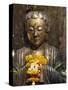 Statue with Offering of Marigold Flowers, Emerald Buddha Temple, Bangkok, Thailand, Southeast Asia-Alain Evrard-Stretched Canvas