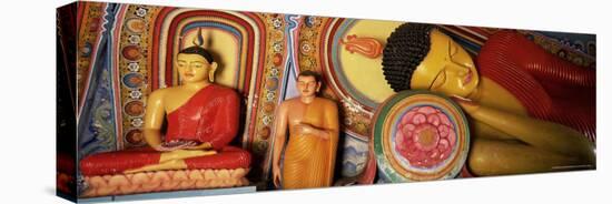 Statues of Seated, Standing and Sleeping Buddha, Isurumuniya, Anuradhapura, Sri Lanka, Asia-Bruno Morandi-Stretched Canvas