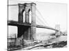 Steam Ship Passing Underneath Brooklyn Bridge-null-Stretched Canvas