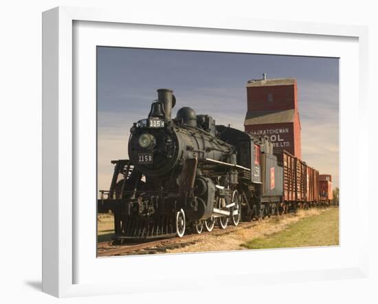 Steam Train and Grain Elevator in Western Development Museum, Saskatchewan, Canada-Walter Bibikow-Framed Premium Photographic Print