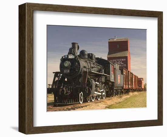 Steam Train and Grain Elevator in Western Development Museum, Saskatchewan, Canada-Walter Bibikow-Framed Photographic Print