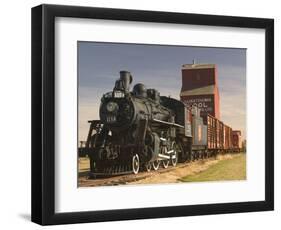 Steam Train and Grain Elevator in Western Development Museum, Saskatchewan, Canada-Walter Bibikow-Framed Photographic Print