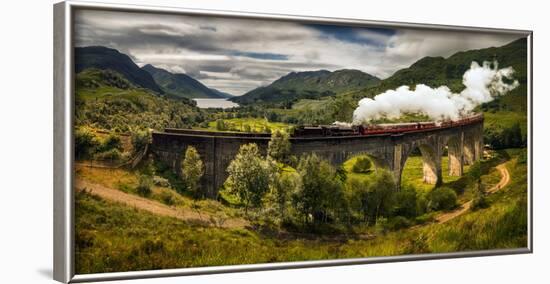 Steam train moving on old bridge, Scotland-null-Framed Photographic Print