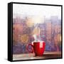 Steaming Cup of Coffee over a Cityscape Background-George D.-Framed Stretched Canvas