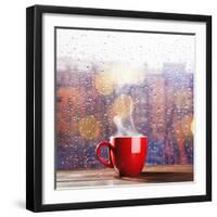 Steaming Cup of Coffee over a Cityscape Background-George D.-Framed Photographic Print