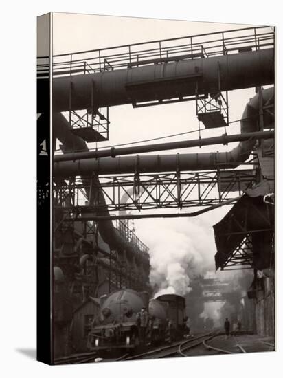 Steaming Hot Steel Slag Being Poured into Freight Cars on Railroad Siding at Steel Plant-Margaret Bourke-White-Stretched Canvas