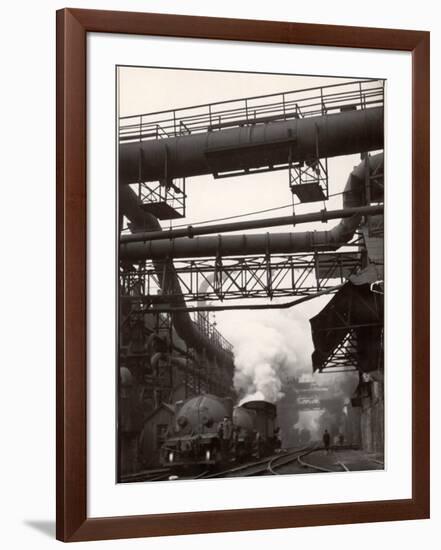 Steaming Hot Steel Slag Being Poured into Freight Cars on Railroad Siding at Steel Plant-Margaret Bourke-White-Framed Photographic Print