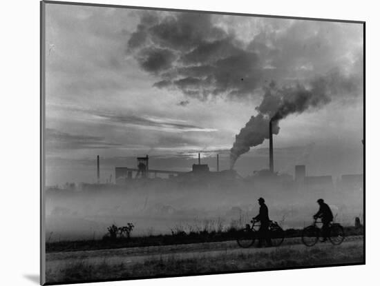 Steel Mill in Dusseldorf, German Steel Workers Bicycling Home from Work-Ralph Crane-Mounted Photographic Print