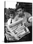 Steelworker Andy Lopata and Son Reading "Steel Labor"-Alfred Eisenstaedt-Stretched Canvas