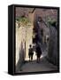 Steep Alleyway, Gubbio, Umbria, Italy-Inger Hogstrom-Framed Stretched Canvas