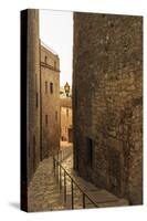 Steep and narrow winding street in gorgeous medieval hilltop walled village, Pals, Baix Emporda, Gi-Eleanor Scriven-Stretched Canvas