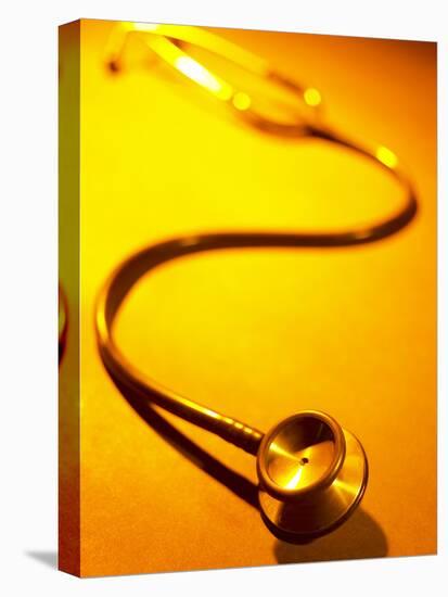 Stethoscope on Yellow Surface-null-Stretched Canvas