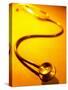 Stethoscope on Yellow Surface-null-Stretched Canvas