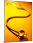 Stethoscope on Yellow Surface-null-Mounted Photographic Print