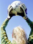 View from Behind of a Girl Holding a Soccer Ball-Steve Cicero-Laminated Photographic Print