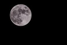 Blue Full Moon Isolated on a Black Sky-Steve Collender-Photographic Print